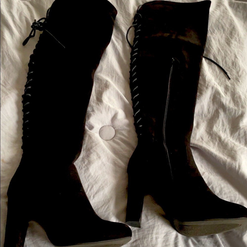 Black knee high boots with lace on back